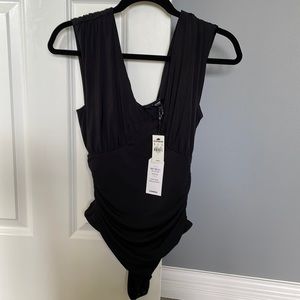 NWT Express body contour tank thong bodysuit size small.